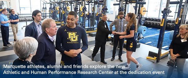 Marquette athletes, alumni and friends explore the new Athletic and Human Performance Research Center at the dedication event, April 29